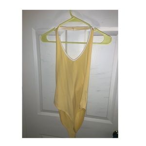 Yellow bodysuit